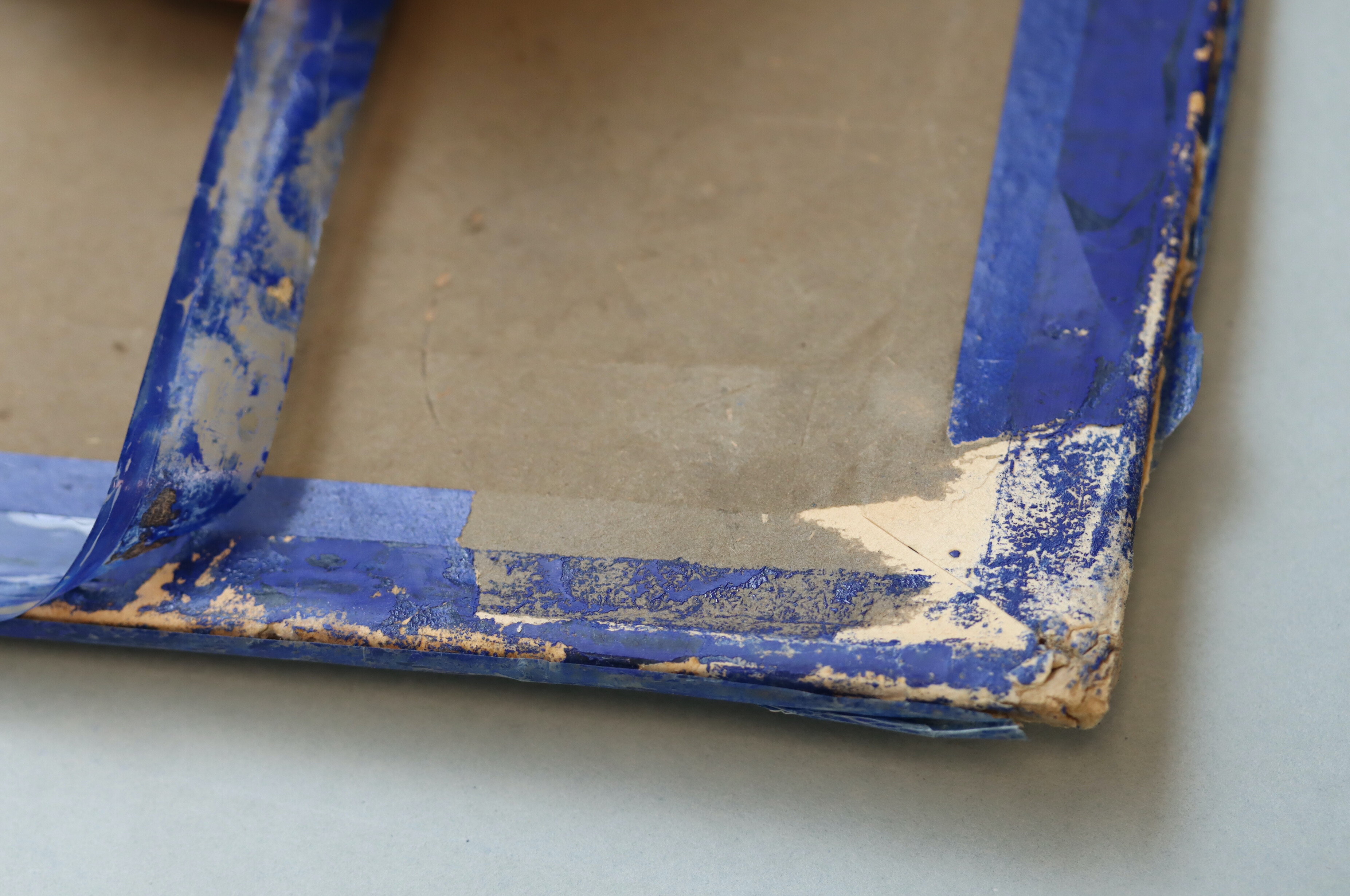 Close-up showing a detail of the glazed paper with transparent pressure-sensitive tapes on the second-floor plan.