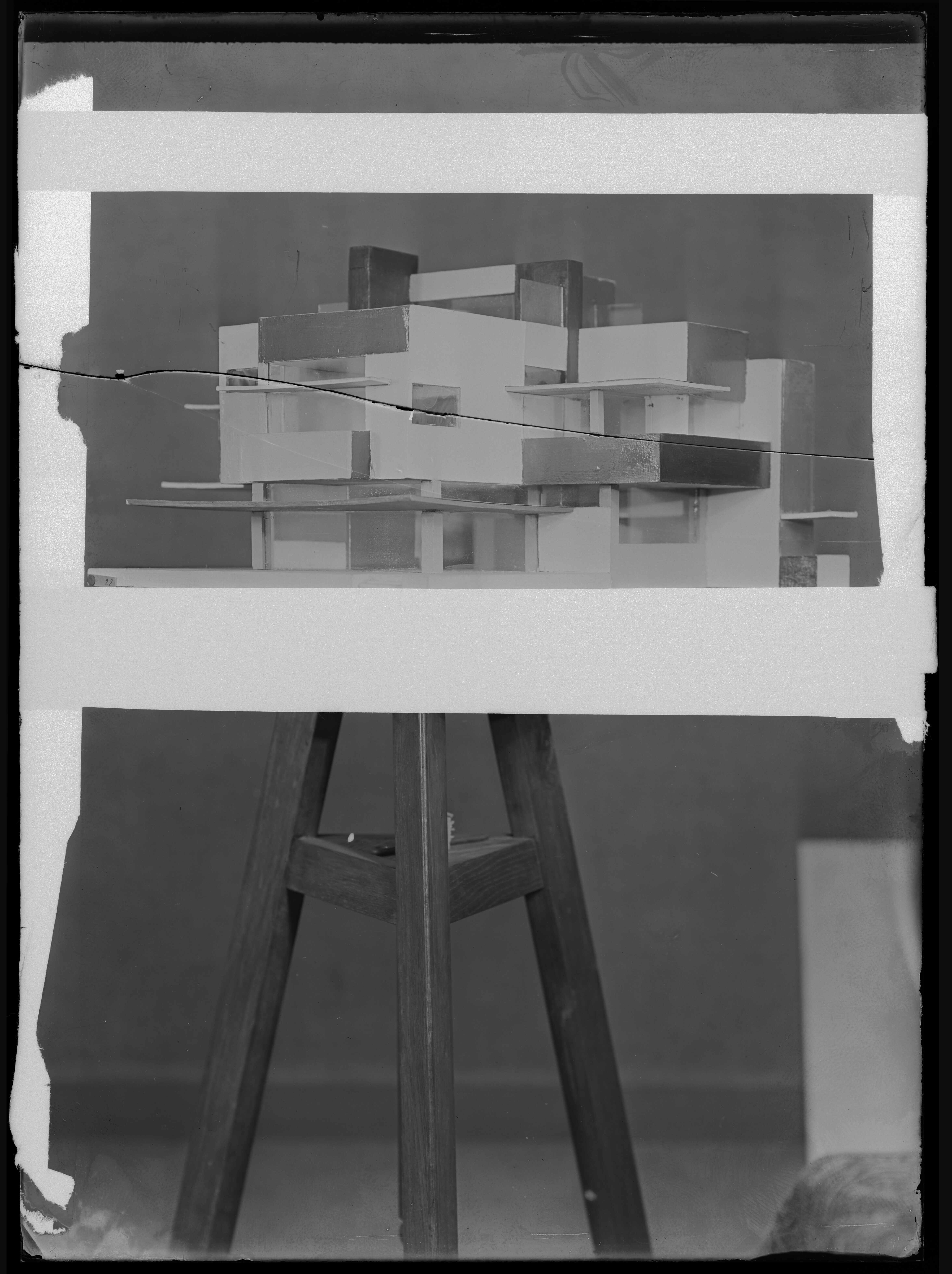 Glass plate negative of the maquette of Maison Particulière, retouched with black paper tape (visible as white on the photograph), framed around the part of the photograph showing the maquette.