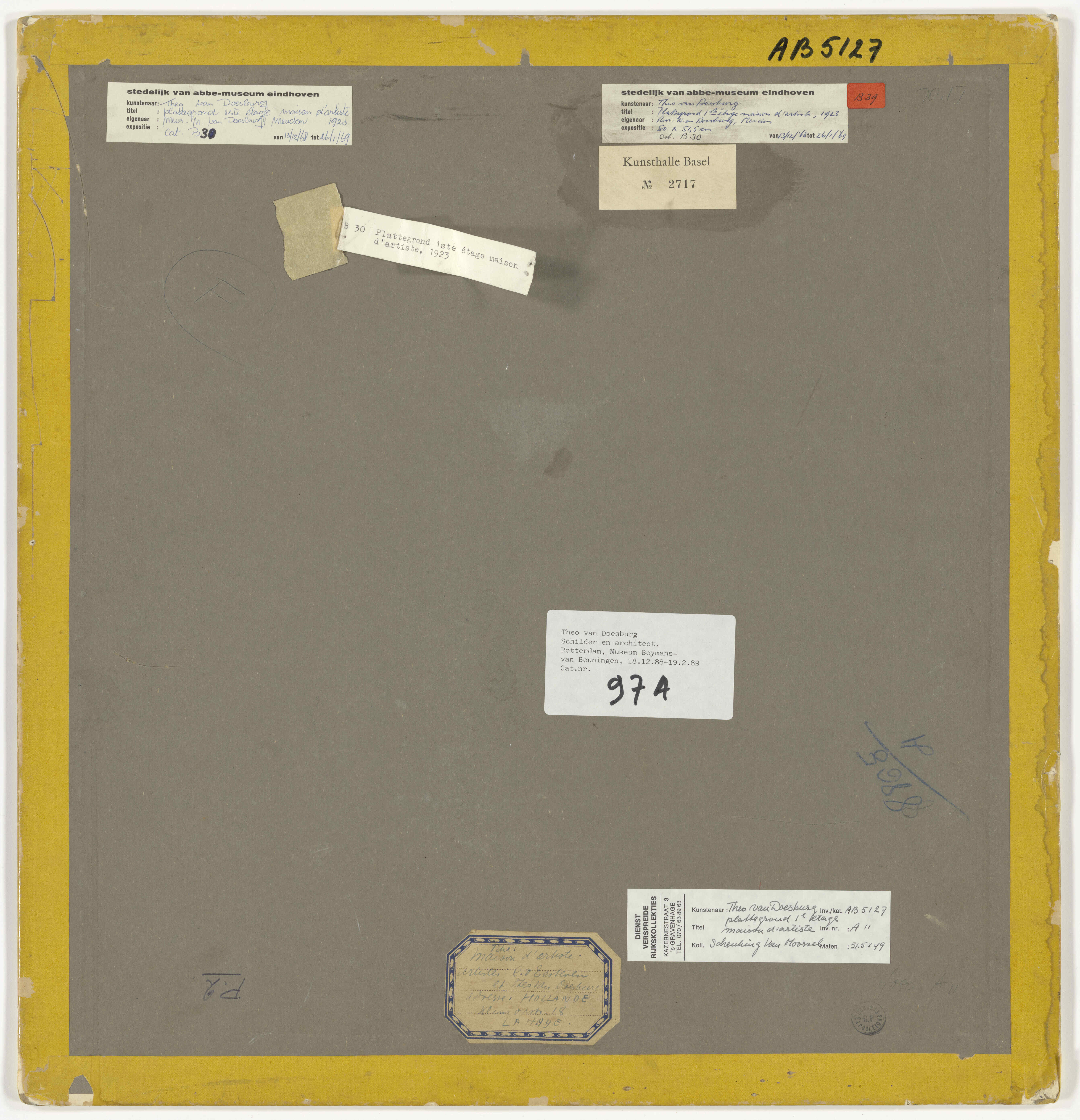 The verso of the first-floor plan of Maison d’Artiste, showing the grey backing paper, yellow-coloured tape, and several labels.