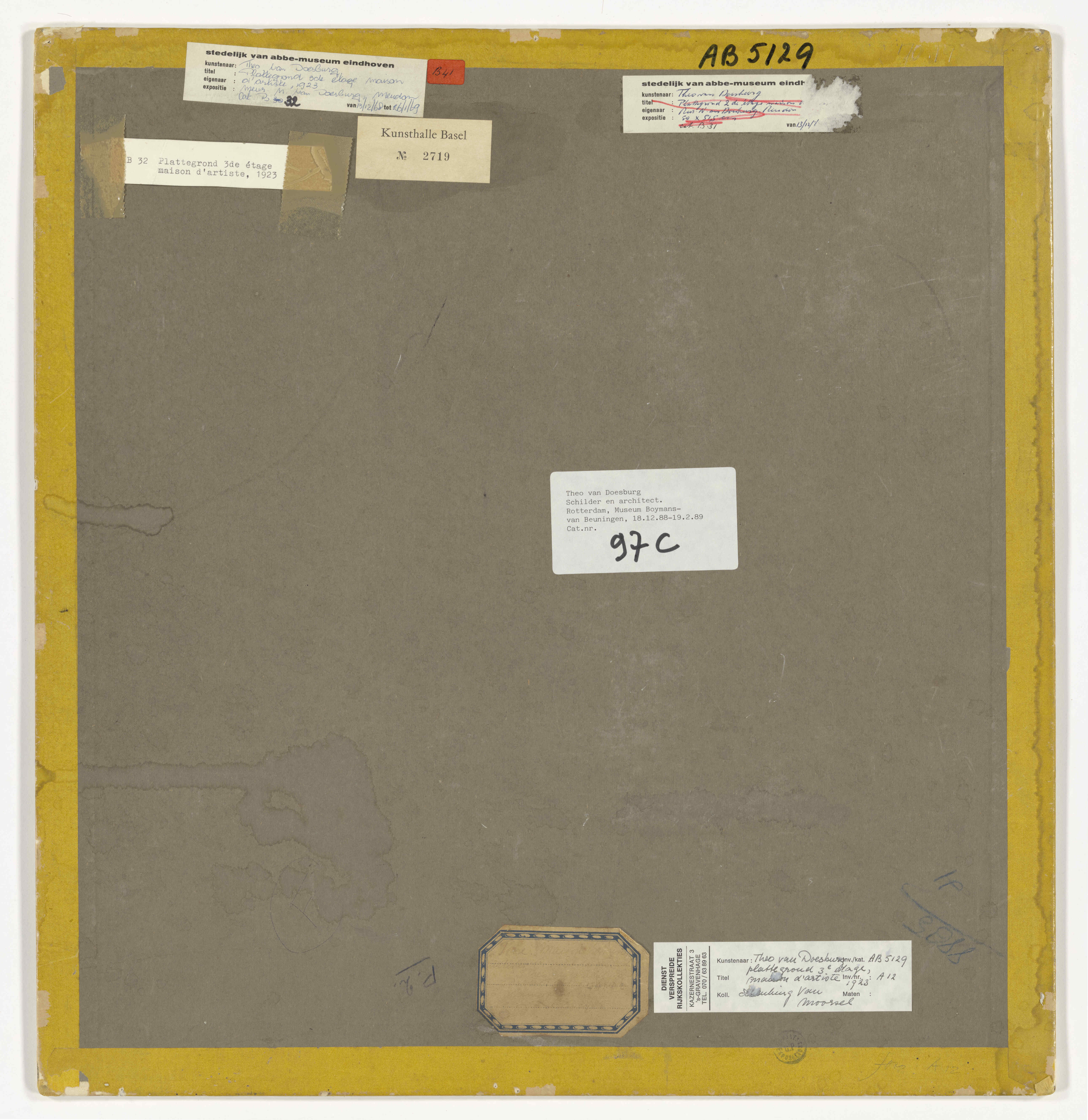 The verso of the third-floor plan of Maison d’Artiste, showing the grey backing paper, yellow-coloured tape, and several labels.