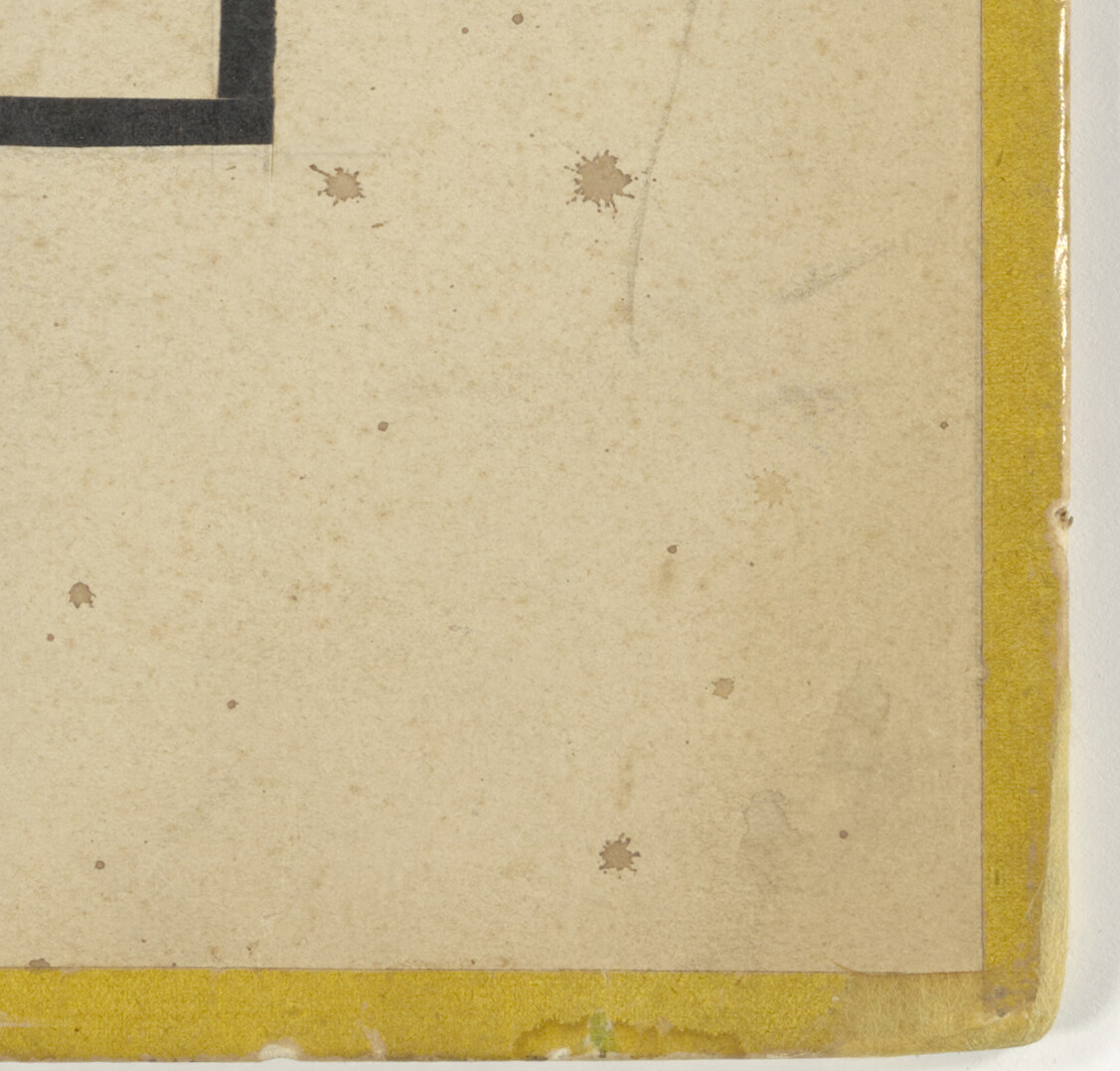 Close-up of the lower right corner of the first-floor plan of Maison d’Artiste, highlighting the yellow-glazed paper.